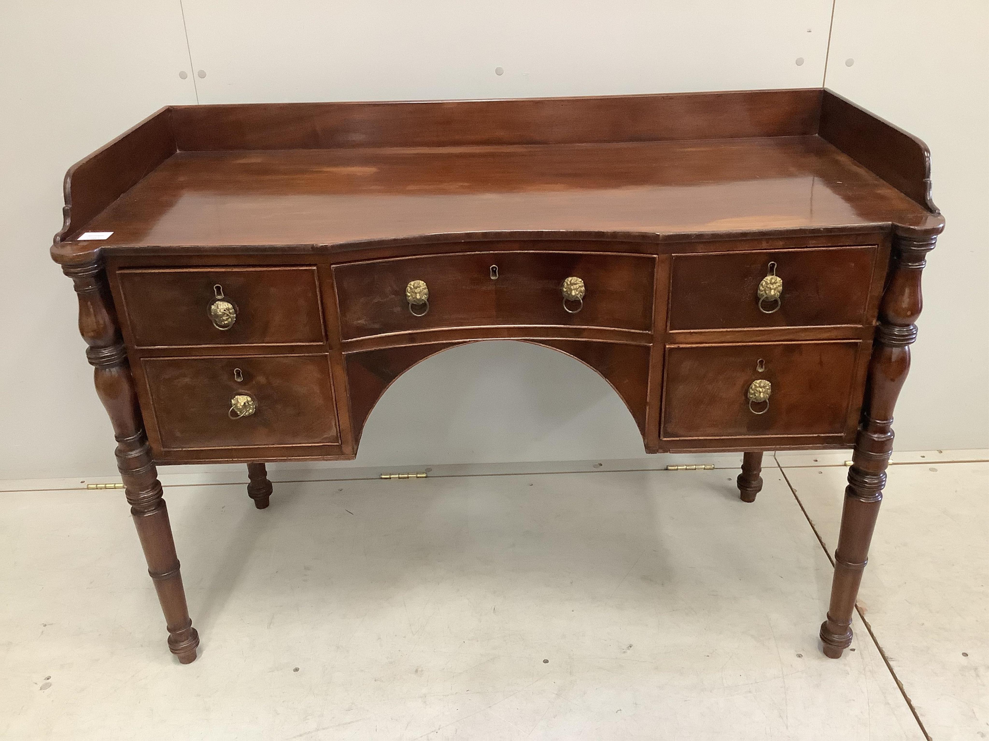 A Regency mahogany concave washstand, width 122cm, depth 55cm, height 86cm. Condition - fair